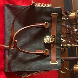 MK pocketbook used twice measurements 14 wide 13 high